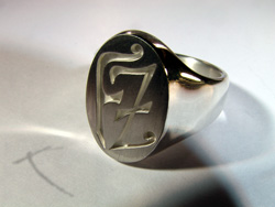 A man-sized signet style ring with the customer's monogram by Kerstin Laibach
